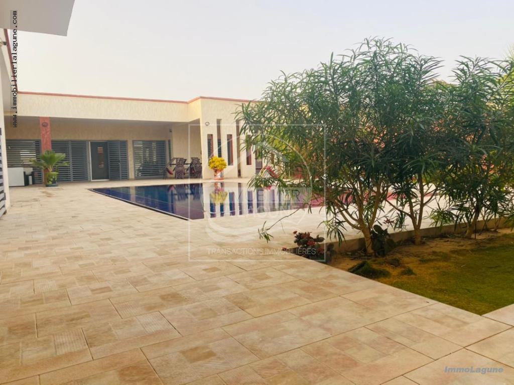 Agence Immobilière Saly Sénégal - V2742 - Villa à NGUERIGNE - V2742-villa-avec-piscine-a-vendre-a-nguerigne-senegal